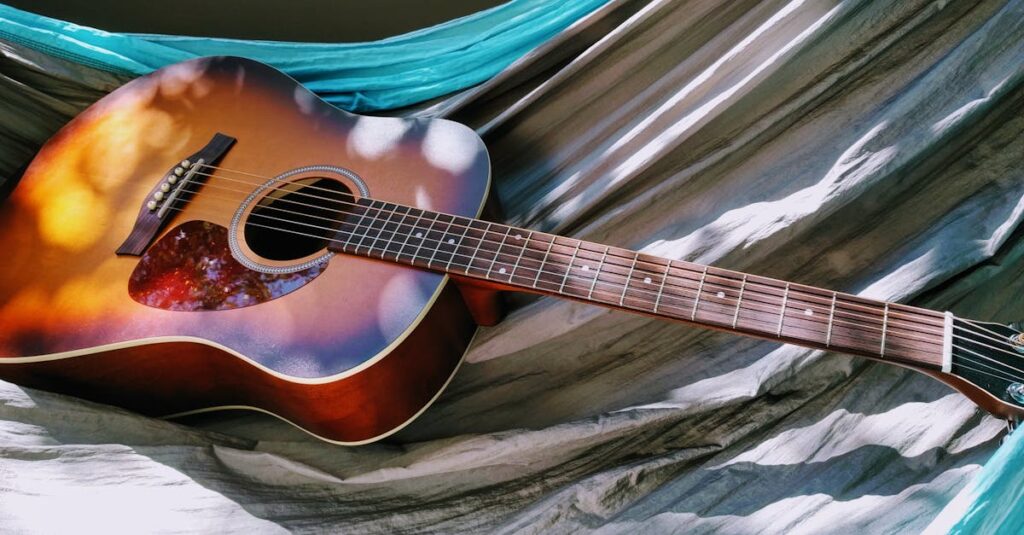 買取価格の表を見ながらギターの相場を確認する男性