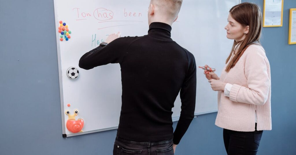 英会話教室の体験レッスンでプロ講師の指導に驚く初心者の様子